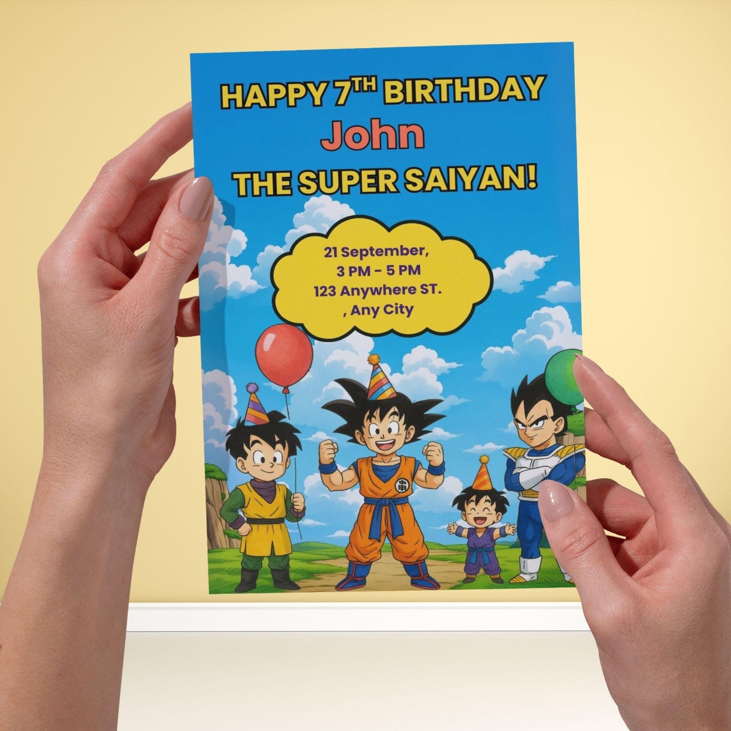 Hands holding ProCardist Dragon Ball Z birthday invitation showing Goku Vegeta and kids in party hats with event details