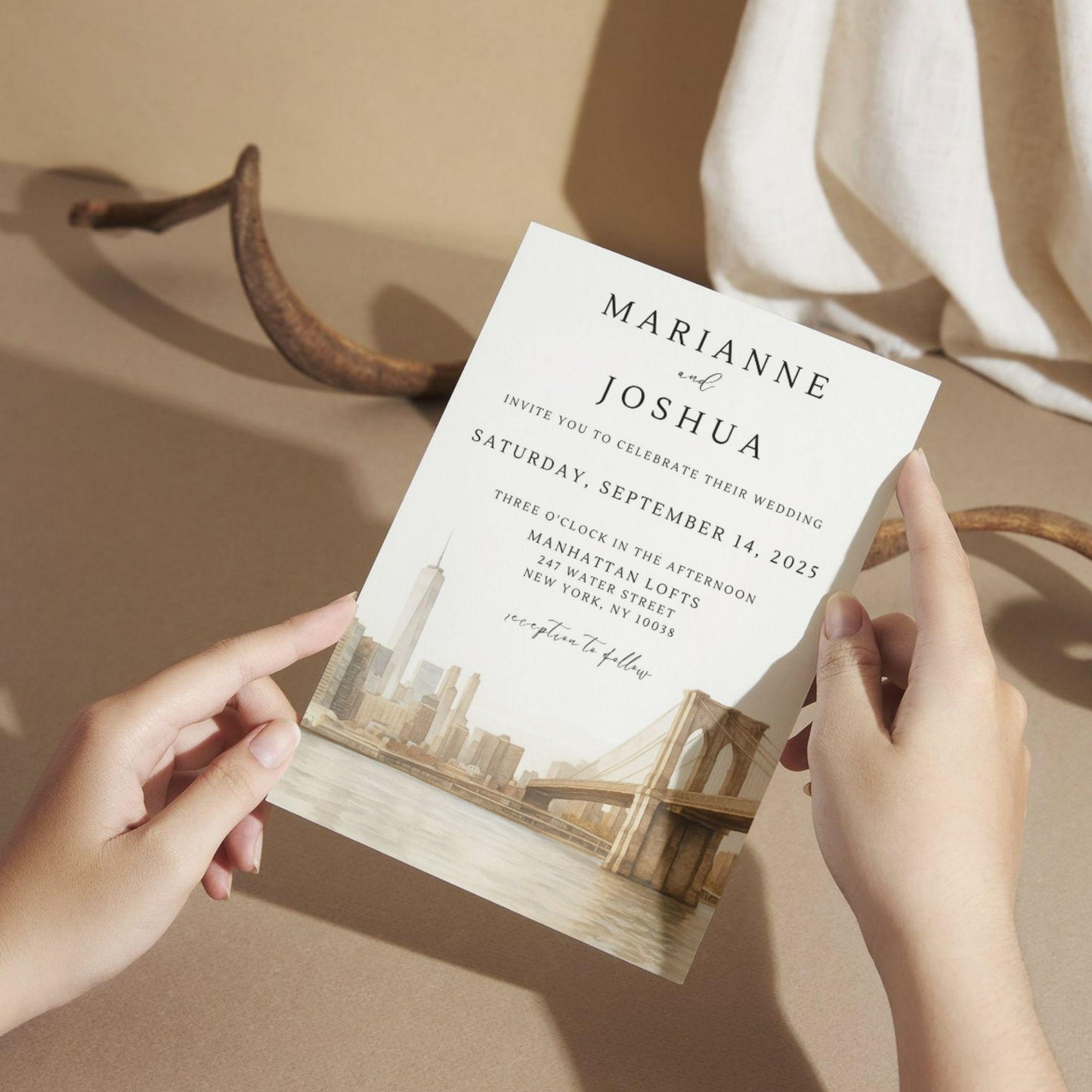 Editable wedding invitation held by hands featuring New York skyline design best personalized wedding invitation template