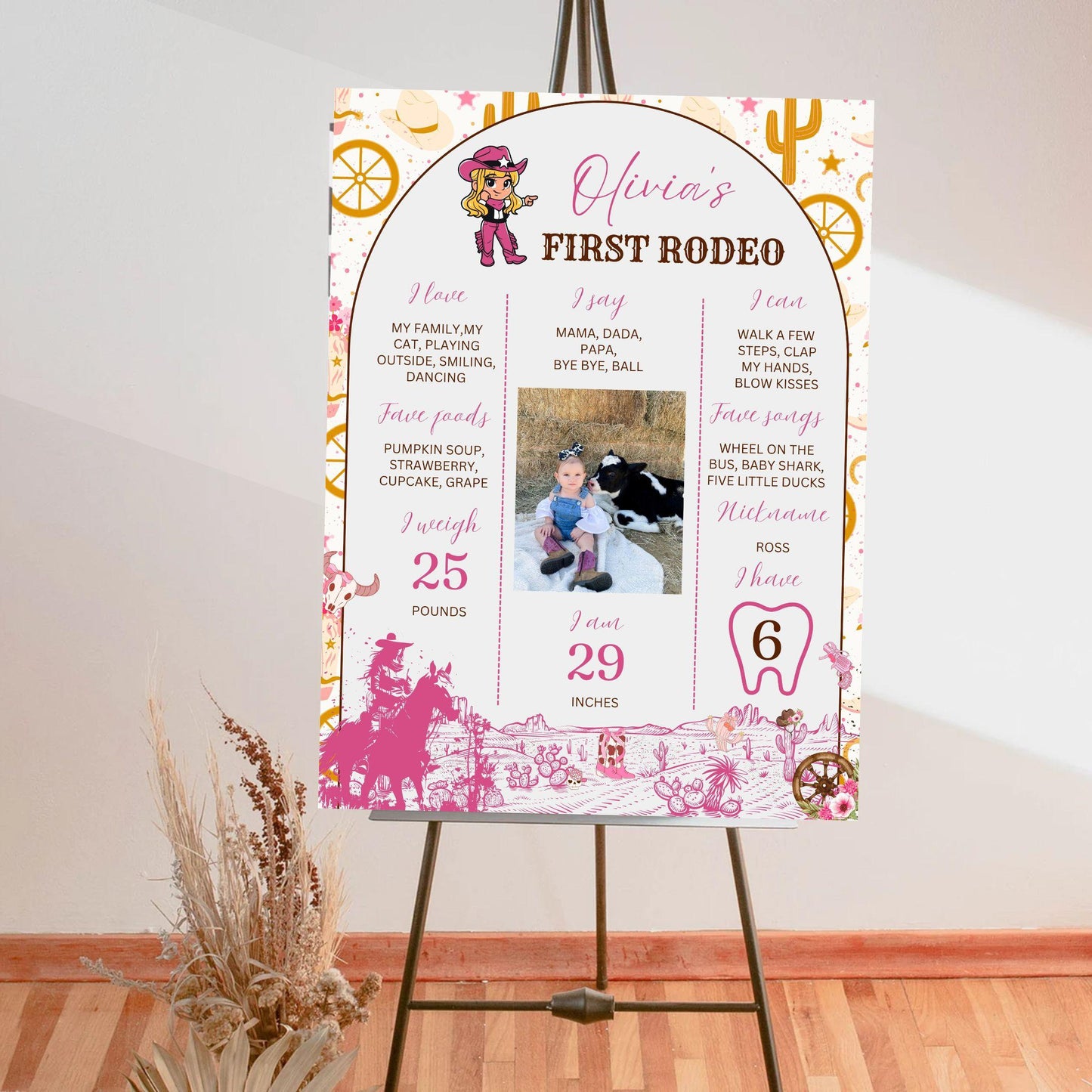 Custom birthday photo sign baby milestone poster with pink rodeo theme and personalized details on easel
