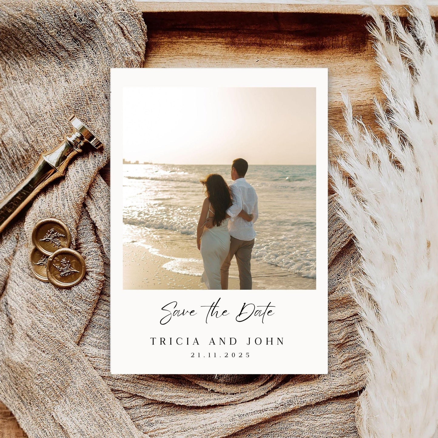 Minimalist wedding invitation template with a photo of a couple on the beach and elegant save the date text