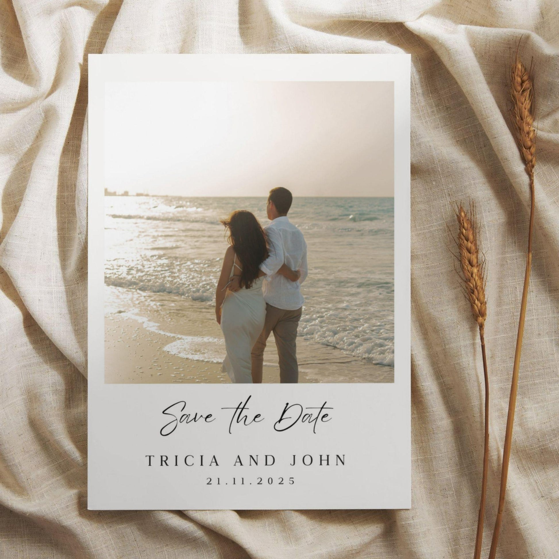 Minimalist wedding invitation template by ProCardist featuring a couple on the beach with save the date text