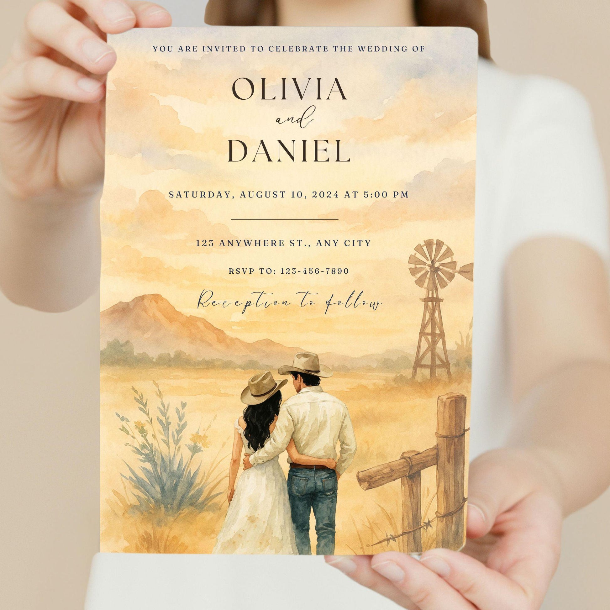 Editable Western wedding invitation template featuring a couple in rustic countryside with windmill and mountains