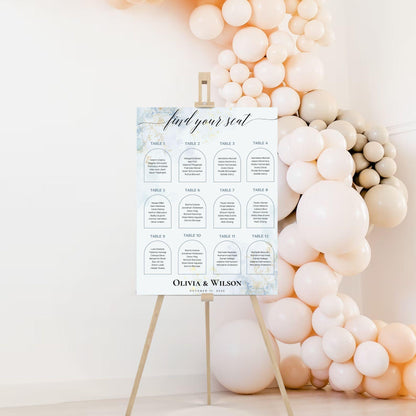 Elegant wedding seating chart template on easel with white balloon decoration by ProCardist