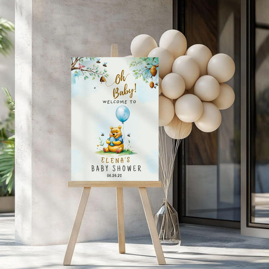 Editable Winnie the Pooh baby shower sign welcoming guests with cute decorations and a balloon