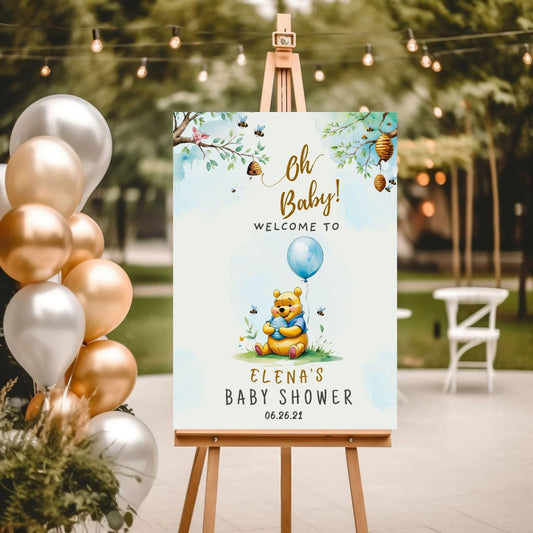 Editable Winnie the Pooh baby shower sign welcoming guests with floral design and customizable names